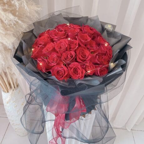 seven florist crimson roses a